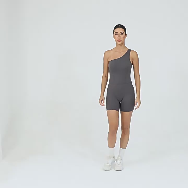 Combinaison de yoga asymétrique unie pour femme